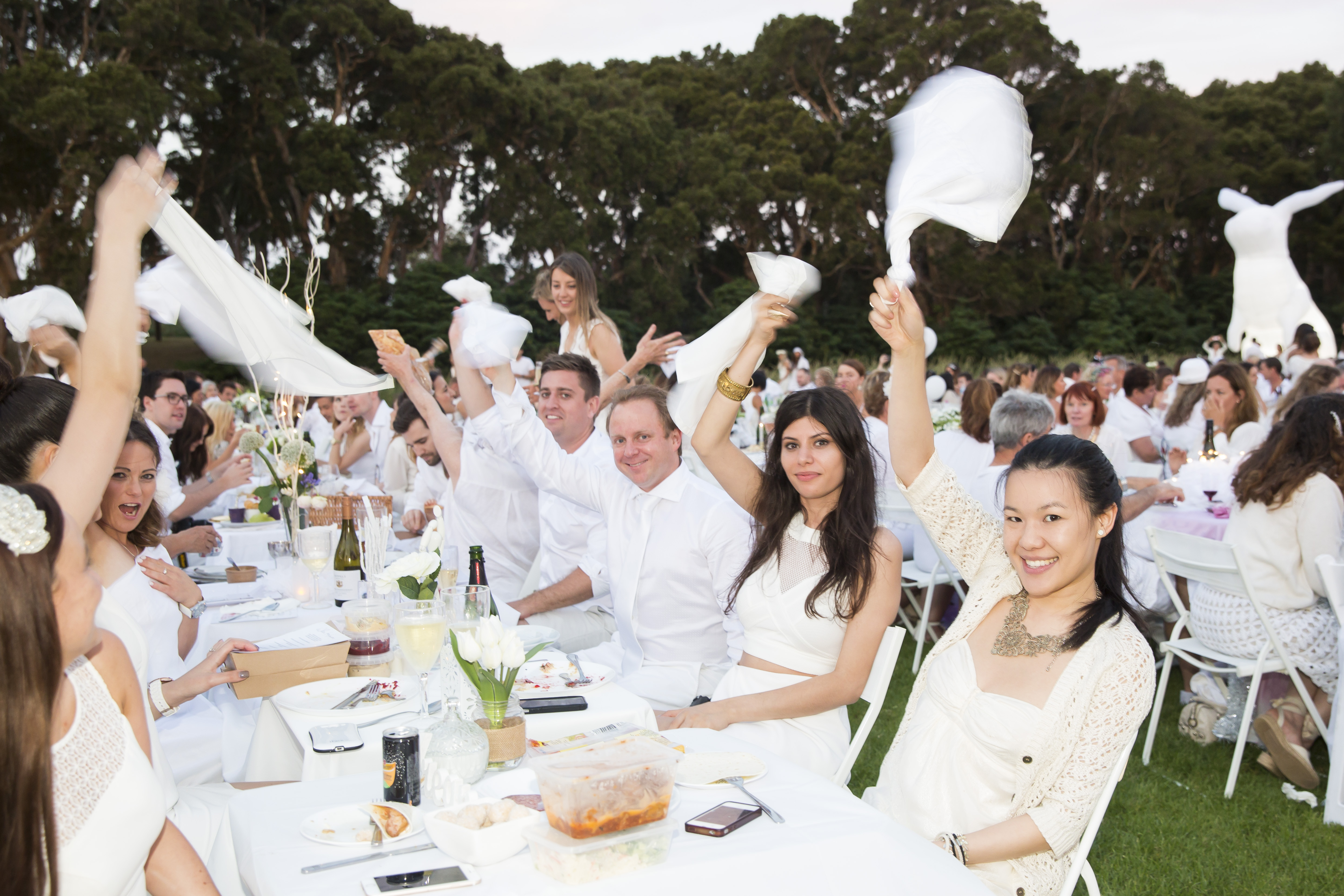 Tradition dictates that the evening begins by waving serviettes.